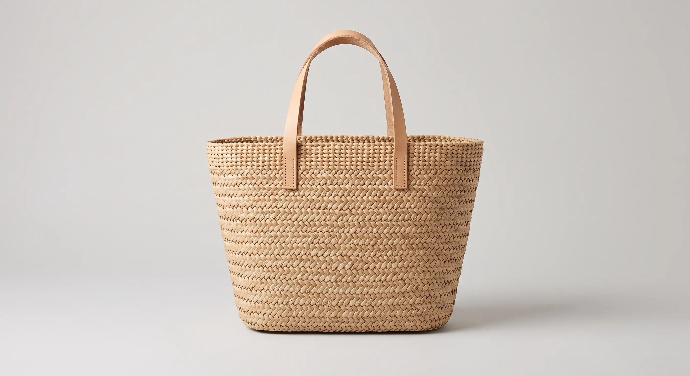 Woven straw tote bag, an accessory styled with Alovia AI virtual try-on